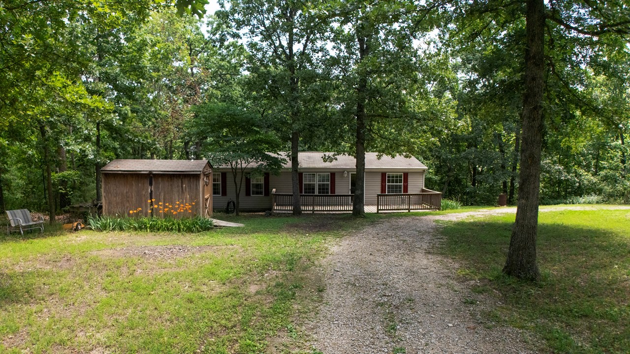 storage shed and circle drive. easy in and out with campers and boats!